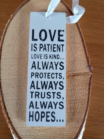 Tekstbord love zwart